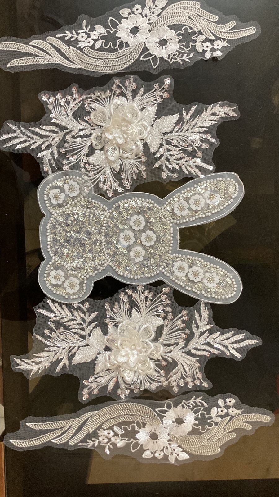 beaded neck, rabbit nd patches